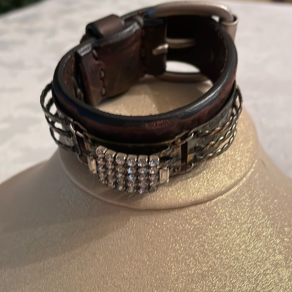 Adjustable leather cuff bracelet with a center stones design